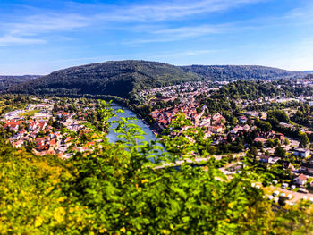 Aerial view of townscape against sky