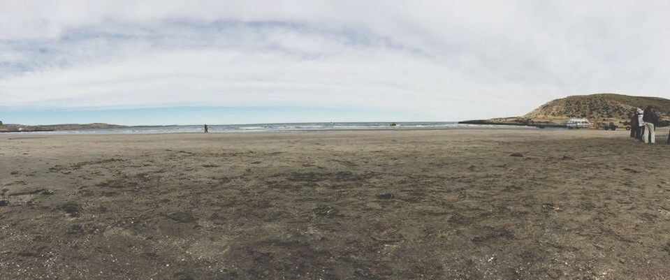 beach, sky, sea, water, sand, shore, cloud - sky, tranquil scene, tranquility, scenics, cloudy, beauty in nature, nature, cloud, horizon over water, coastline, incidental people, idyllic, day, outdoors