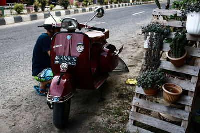 High angle view of motor scooter on road