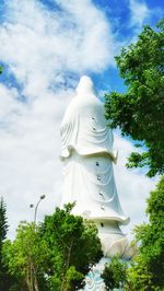 Low angle view of statue against sky