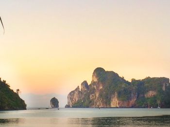 Scenic view of sea against clear sky during sunset