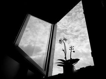 Low angle view of sky seen through window