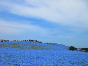 Scenic view of sea against cloudy sky