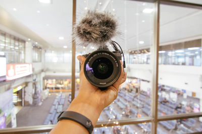 Midsection of man photographing