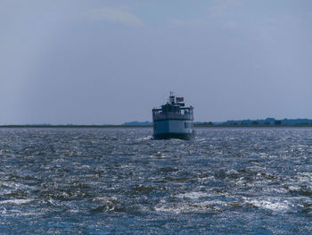 Boat sailing in sea