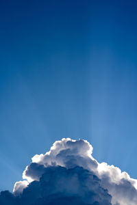 Low angle view of clouds in blue sky
