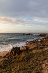 Scenic view of sea against sky during sunset