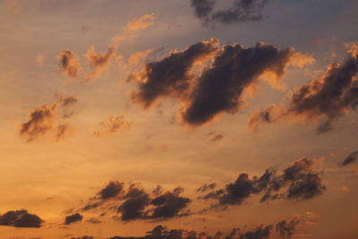 Low angle view of dramatic sky during sunset