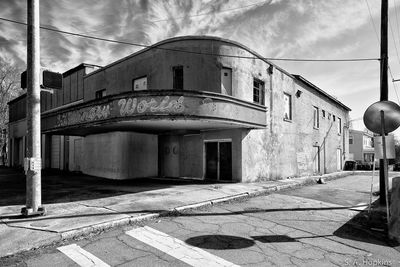 Street amidst buildings against sky