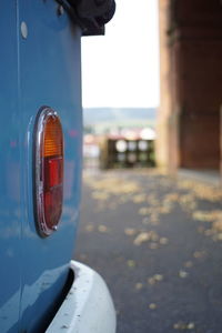 Close-up of car on street