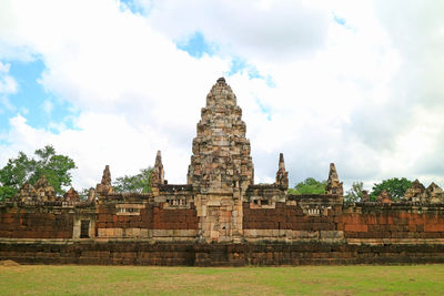 Old temple building against sky