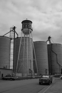 Low angle view of factory against sky