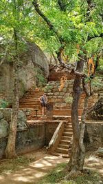 Man climbing on steps