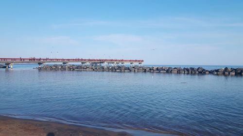 Scenic view of sea against blue sky