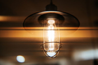 Low angle view of illuminated light bulb