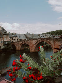 Bridge over river against sky