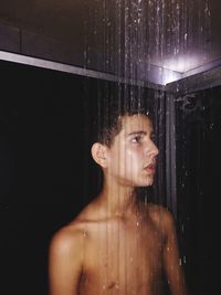 Portrait of young man in bathroom