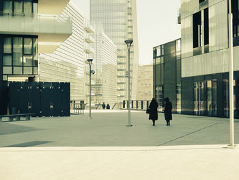 People walking on city street