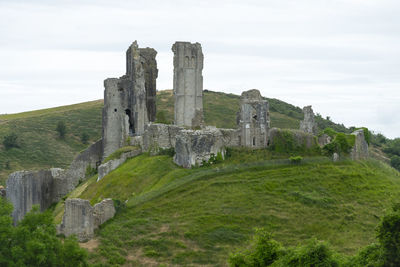 Low angle view of old ruins against sky