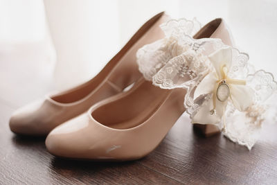 High angle view of white shoes on table