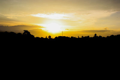 Scenic view of silhouette landscape against sky during sunset