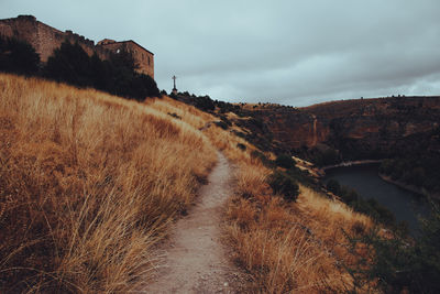 Scenic view of land against sky