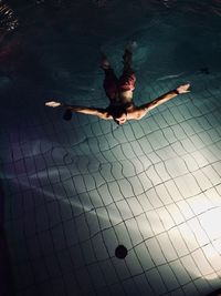 High angle view of man swimming in pool