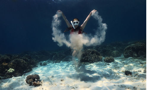 Man swimming in sea