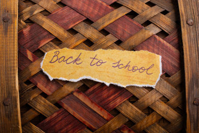 Text written on wooden plank