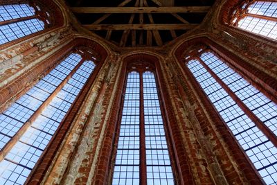 Low angle view of glass ceiling of building