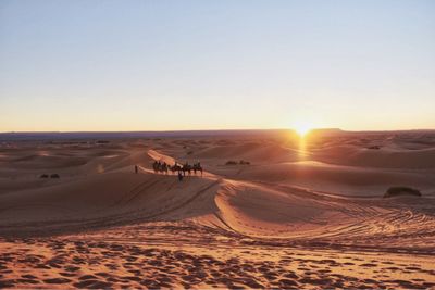 View of desert against clear sky