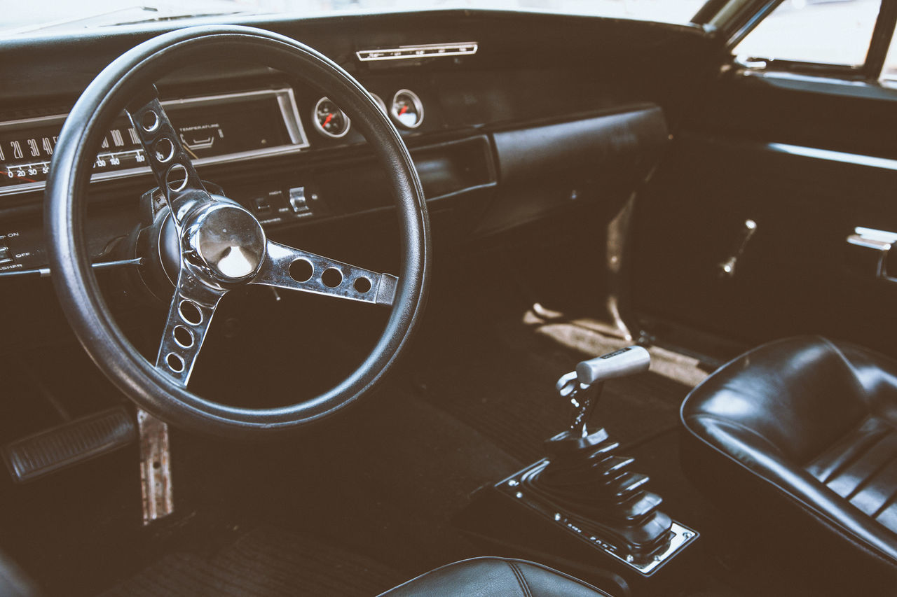 CLOSE-UP OF CLOCK ON CAR