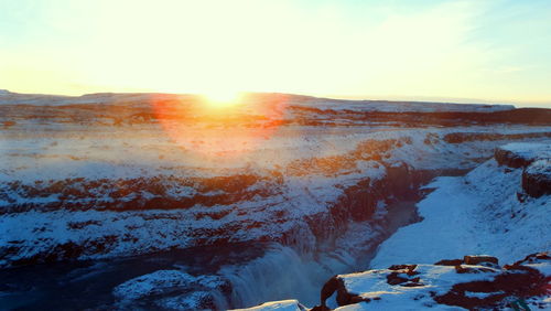 Scenic view of landscape against sky during sunset