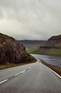 Scenic view of landscape against cloudy sky