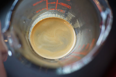 High angle view of coffee in glass