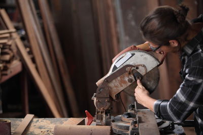 Carpenter working at workshop