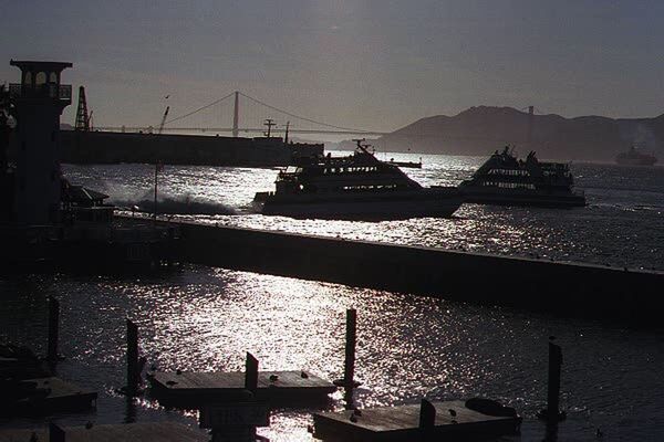 SILHOUETTE OF BRIDGE IN CITY