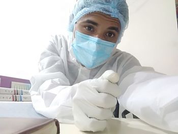 Portrait of woman wearing mask