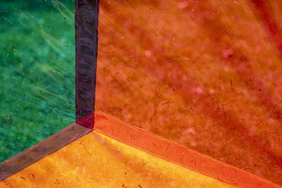 High angle view of orange window on wall