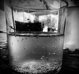 Close-up of water in glass on table