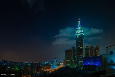 Illuminated buildings in city at night