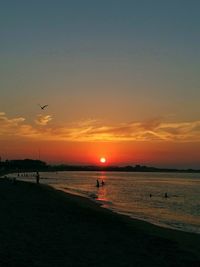 Scenic view of beach during sunset