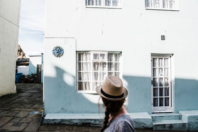 Woman wearing a hat on holiday at the coast