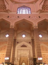 Low angle view of ornate ceiling in historic building