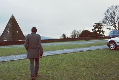 Woman walking on field