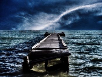 Empty jetty leading to sea
