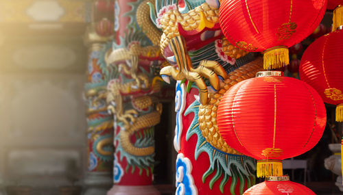 Close-up of lanterns hanging in temple