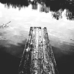 High angle view of pier over lake against sky