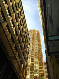 Low angle view of skyscraper against sky