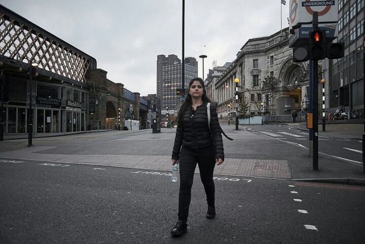 full length, one person, front view, building exterior, built structure, city, architecture, young adult, outdoors, city life, one woman only, casual clothing, day, young women, standing, one young woman only, real people, adults only, portrait, sky, only women, smiling, adult, people